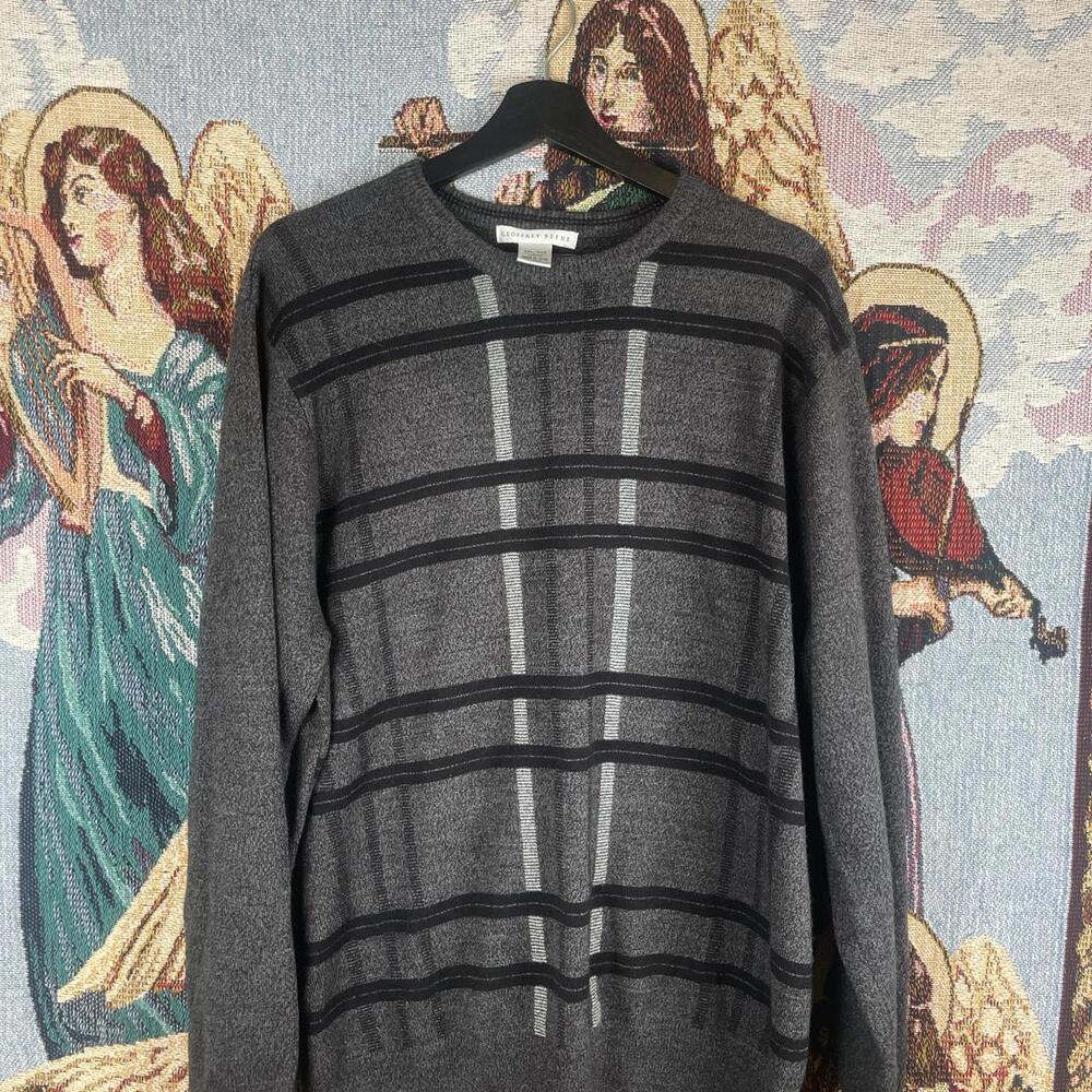 Geoffrey Beene Grey and black striped sweater with a relaxed fit